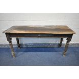 A VICTORIAN PINE SIDE TABLE, with a single drawer, on turned legs, length 148cm x depth 55cm x