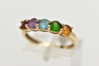 A 9CT GOLD FIVE STONE RING, designed with a row of five claw set, circular cut cabochon stones to