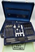 A BRIEFCASE 'SBS SOLINGEN' CANTEEN, twelve person table setting of stainless steel cutlery in a blue
