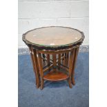 A WALNUT CIRCULAR COFFEE/NEST OF TABLES, with a wavy gallery top, with four smaller triangular
