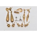 A SMALL BAG OF ASSORTED EARRINGS, to include a pair of hollow tear drop earrings with a stain