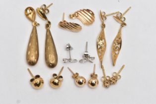 A SMALL BAG OF ASSORTED EARRINGS, to include a pair of hollow tear drop earrings with a stain