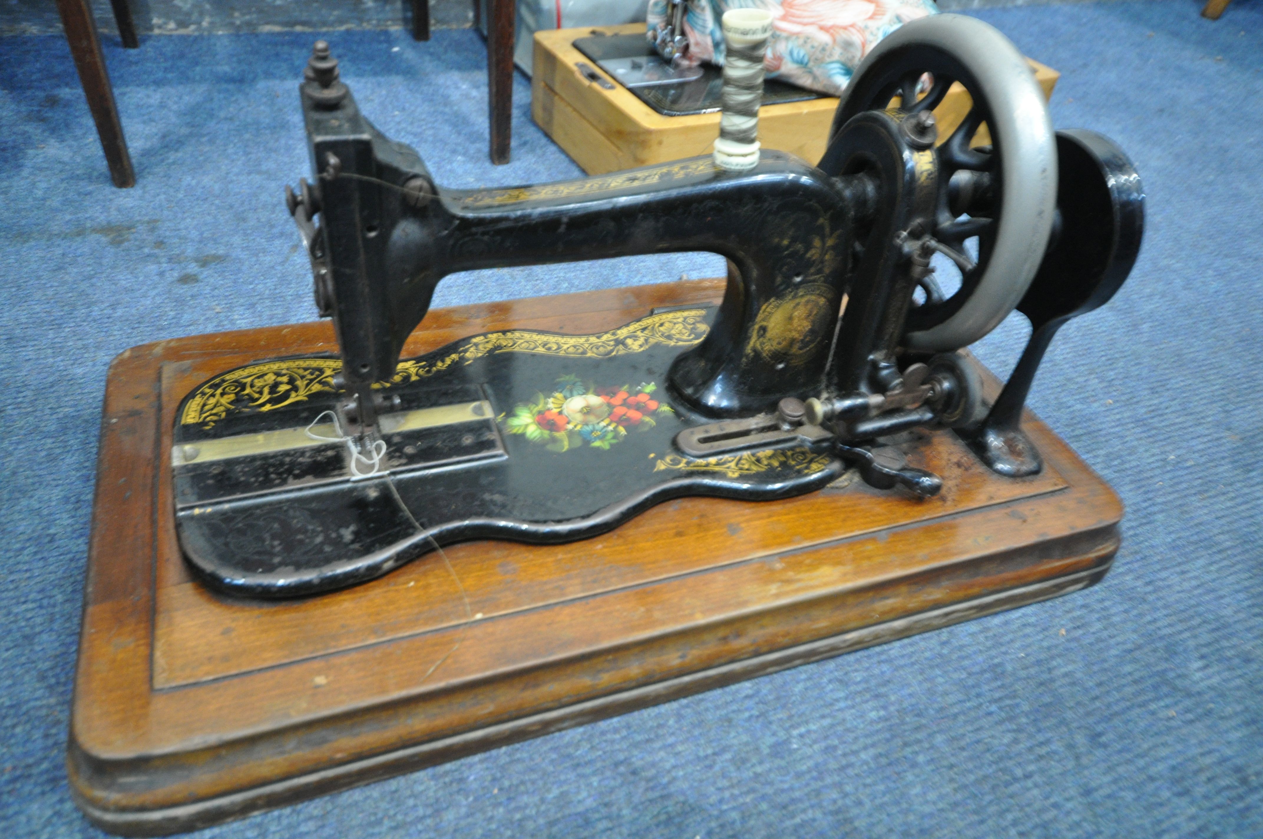 A VINTAGE MAHOGANY CASED BRADBURY & CO NO1 SEWING MACHINE (condition:-gilt partly worn, chips to - Image 2 of 6