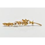 A 9CT YELLOW GOLD BROOCH, in the form of a leaf, set with seven graduated cultured pearls, fitted
