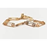 A 9CT GOLD ORTAK LINE BRACELET, decorated with a series of rectangular open work links with floral