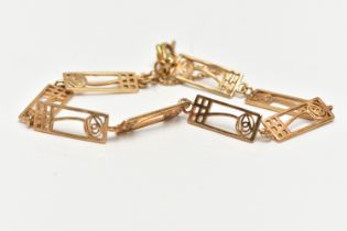A 9CT GOLD ORTAK LINE BRACELET, decorated with a series of rectangular open work links with floral