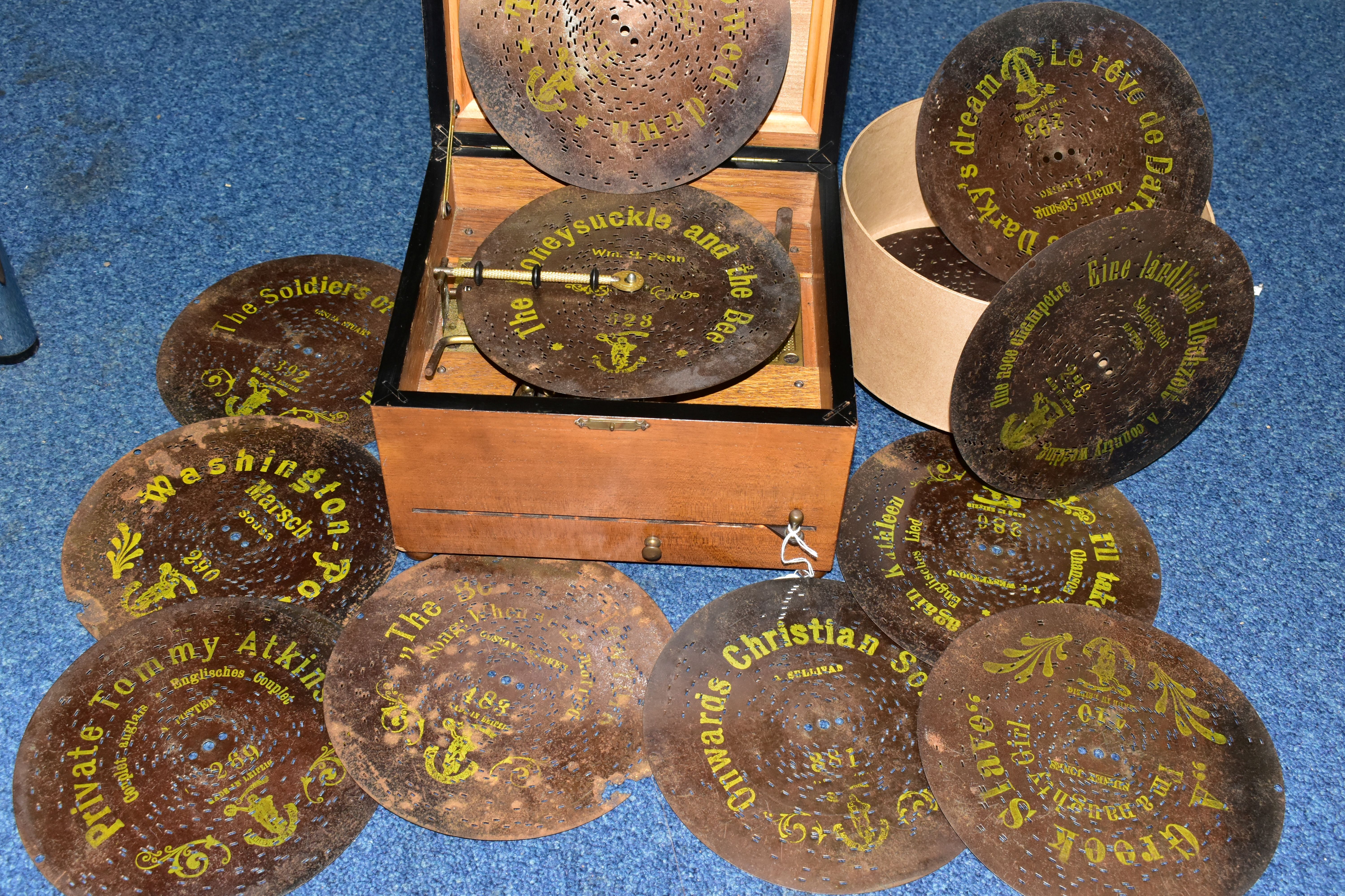 AN EARLY 20TH CENTURY POLYPHON, fitted with six bells, complete with twelve 8 discs