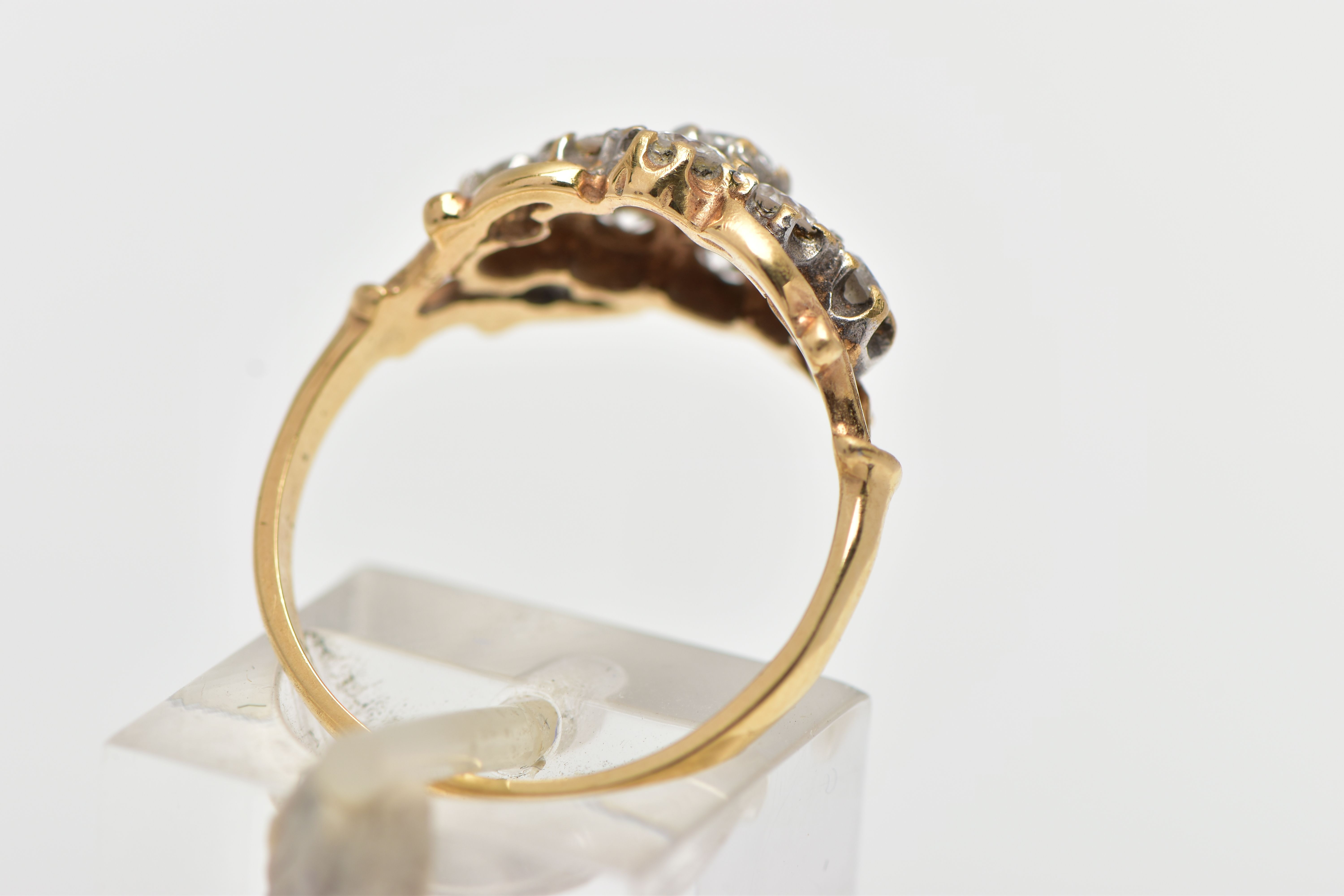 A 9CT YELLOW GOLD DIAMOND CLUSTER RING, of a lozenge shape, set with nine claw set round brilliant - Image 3 of 5