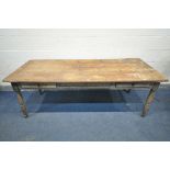 A 19TH CENTURY FARMHOUSE TABLE, the pine top with penny slots, three frieze drawers, on an oak base,
