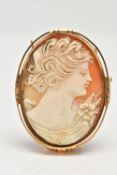 A FRENCH 18CT GOLD CAMEO BROOCH, of an oval form, carved shell cameo depicting a lady in profile,