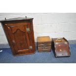 A GEORGIAN AND LATER OAK SINGLE DOOR HANGING CORNER CUPBOARD, width 60cm x depth 34cm x height 81cm,