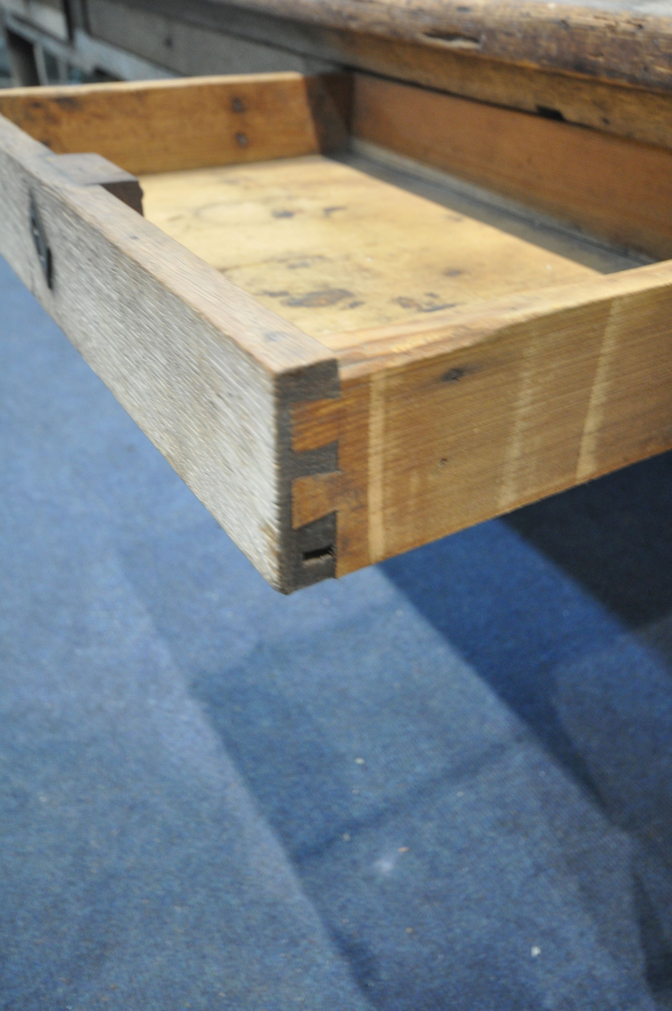 A 19TH CENTURY FARMHOUSE TABLE, the pine top with penny slots, three frieze drawers, on an oak base, - Image 6 of 6