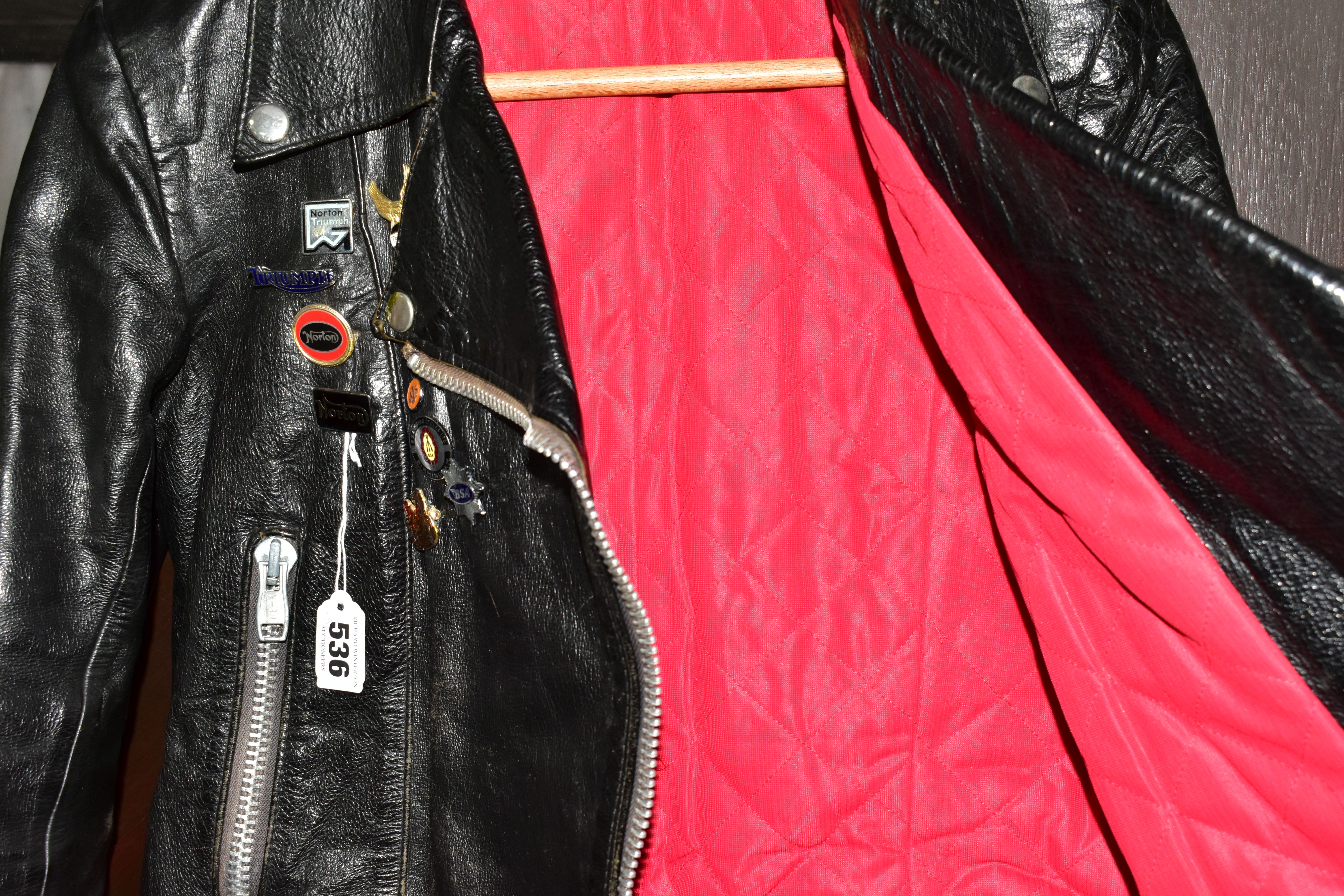 A BLACK LEATHER PIN BADGE BIKER'S JACKET, size small, Frank N Furter style, with sixteen metal pin - Image 4 of 6