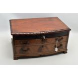 AN EMPTY MAHOGANY CANTEEN, open top with key and two draws, raised on four small feet