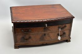 AN EMPTY MAHOGANY CANTEEN, open top with key and two draws, raised on four small feet