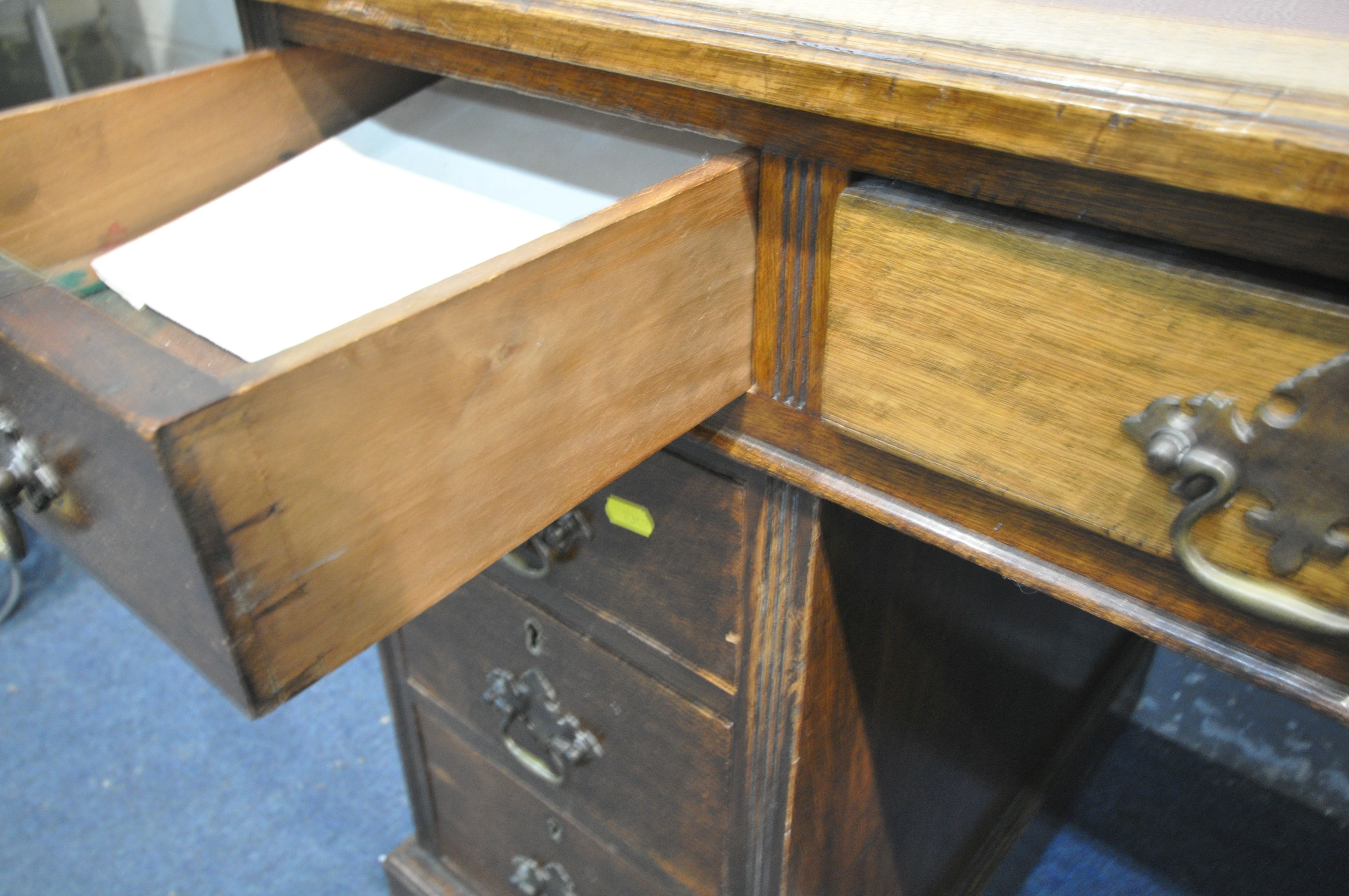 AN EDWARDIAN OAK PEDESTAL DESK, with burgundy leatherette writing surface, and nine various drawers, - Image 3 of 3