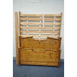 A MODERN PINE 4FT6 BEDSTEAD, with side rails, slats, and bolts