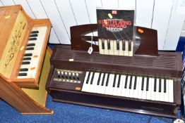 A GEISE CHILDREN'S PIANO TOGETHER WITH A MAGNUS ELECTRIC CHORD-ORGAN, the children's piano height