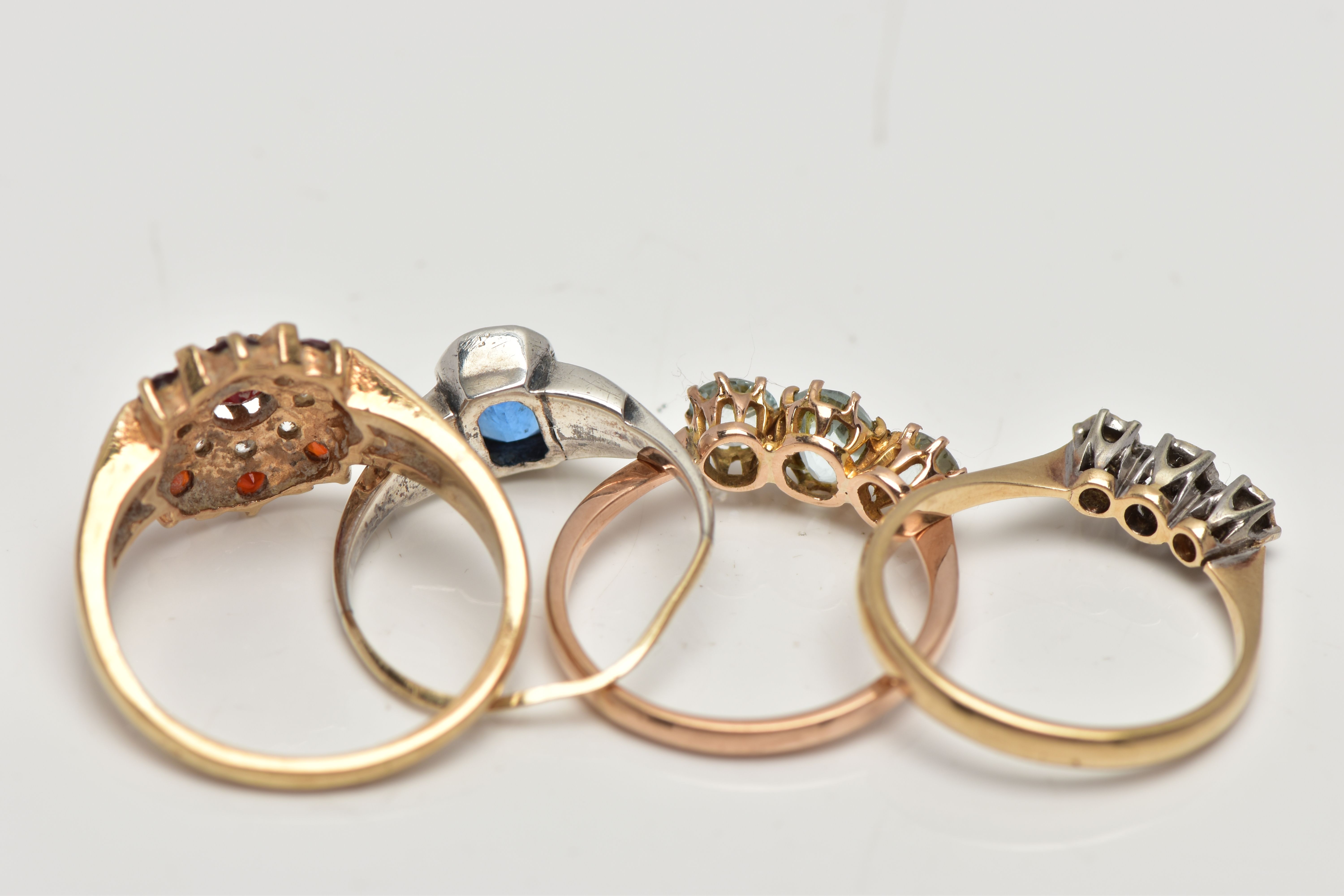 A SELECTION OF FOUR GEM SET RINGS, to include an early 20th century blue and colourless paste - Image 4 of 4