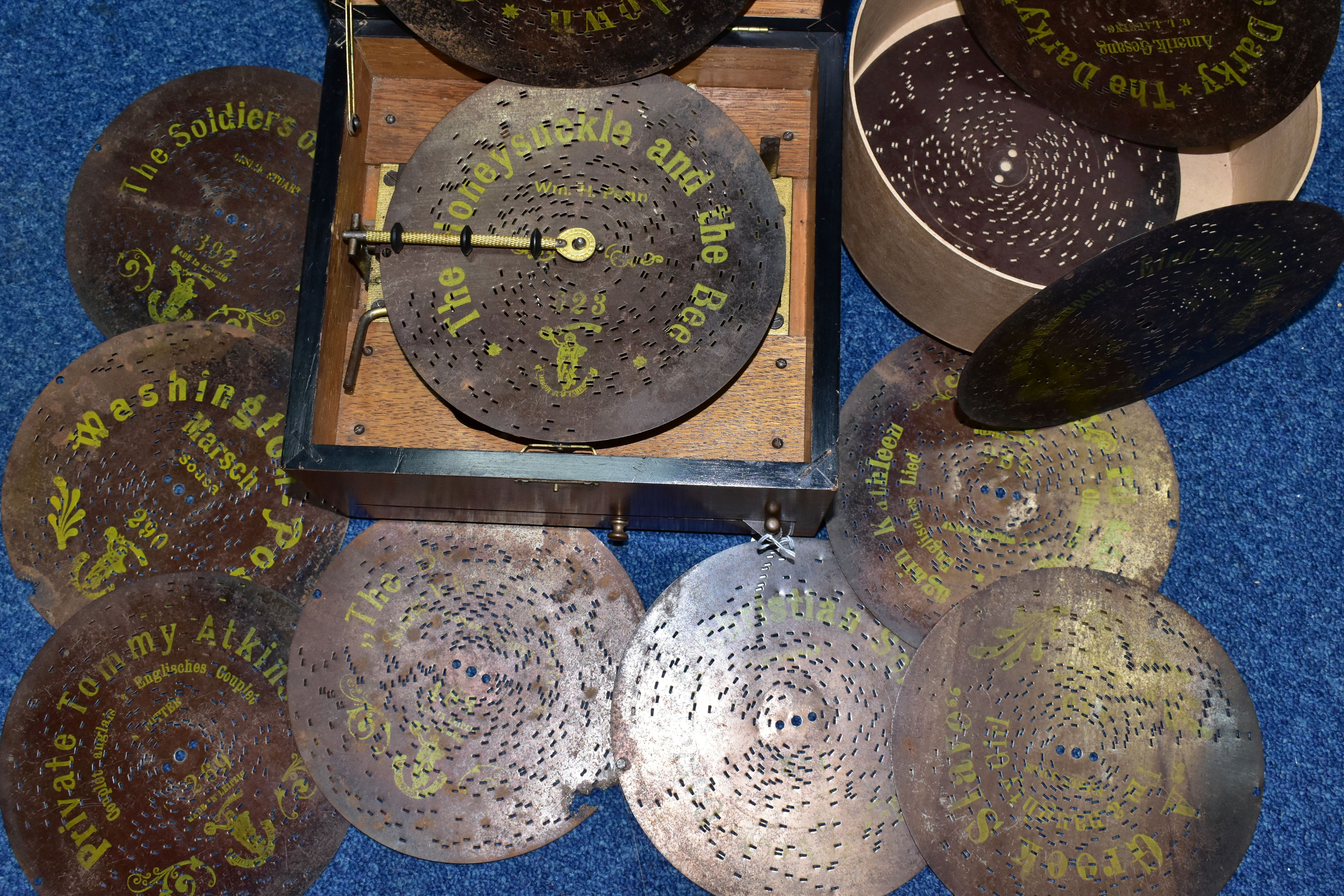 AN EARLY 20TH CENTURY POLYPHON, fitted with six bells, complete with twelve 8 discs - Image 3 of 8