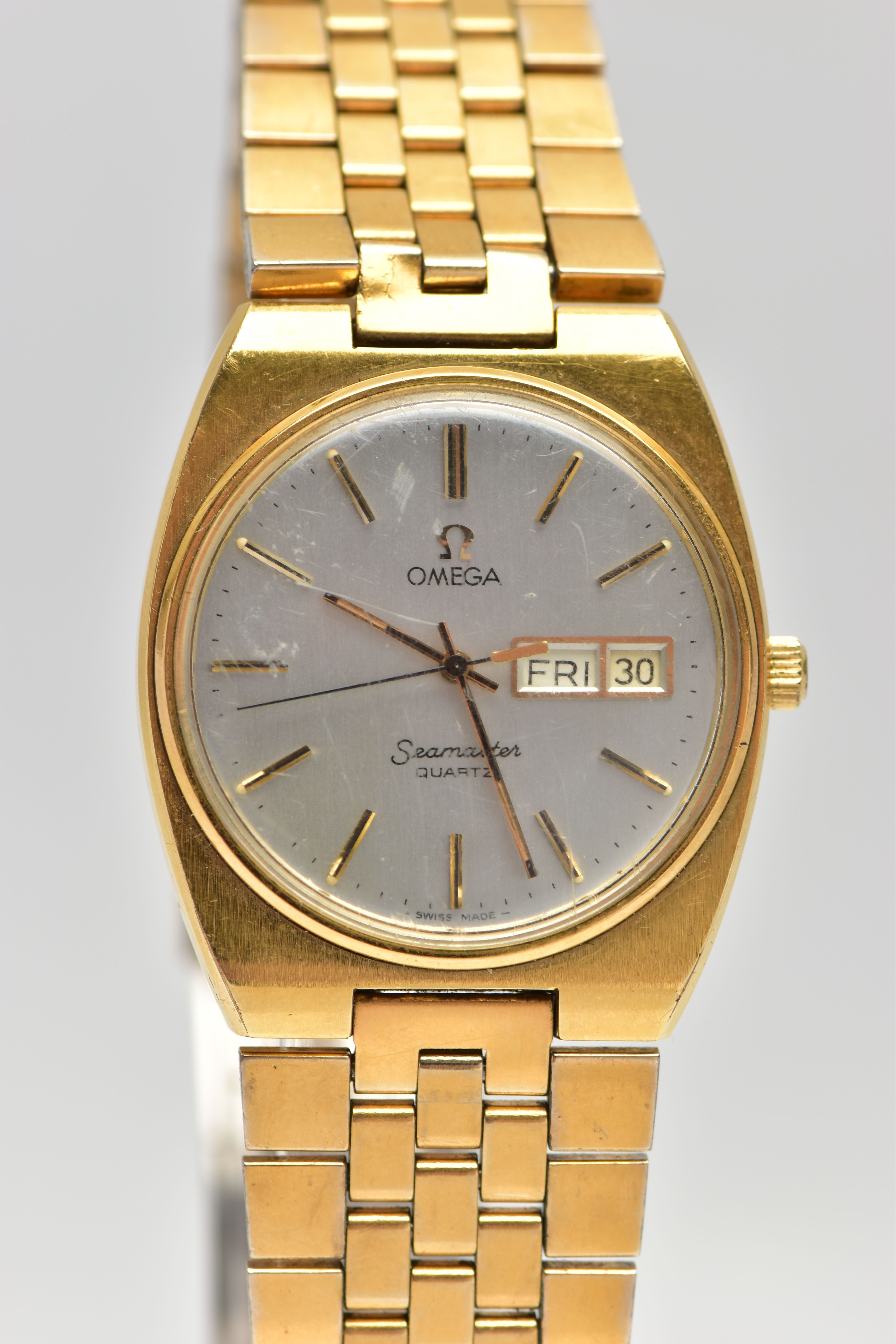 A GOLD PLATED 'OMEGA SEAMASTER QUARTZ' WRISTWATCH, round silver dial signed 'Omega Seamaster