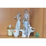 A GROUP OF LLADRO FIGURINES AND CANDLES, comprising four figurines: 'Loving Protection' 8245