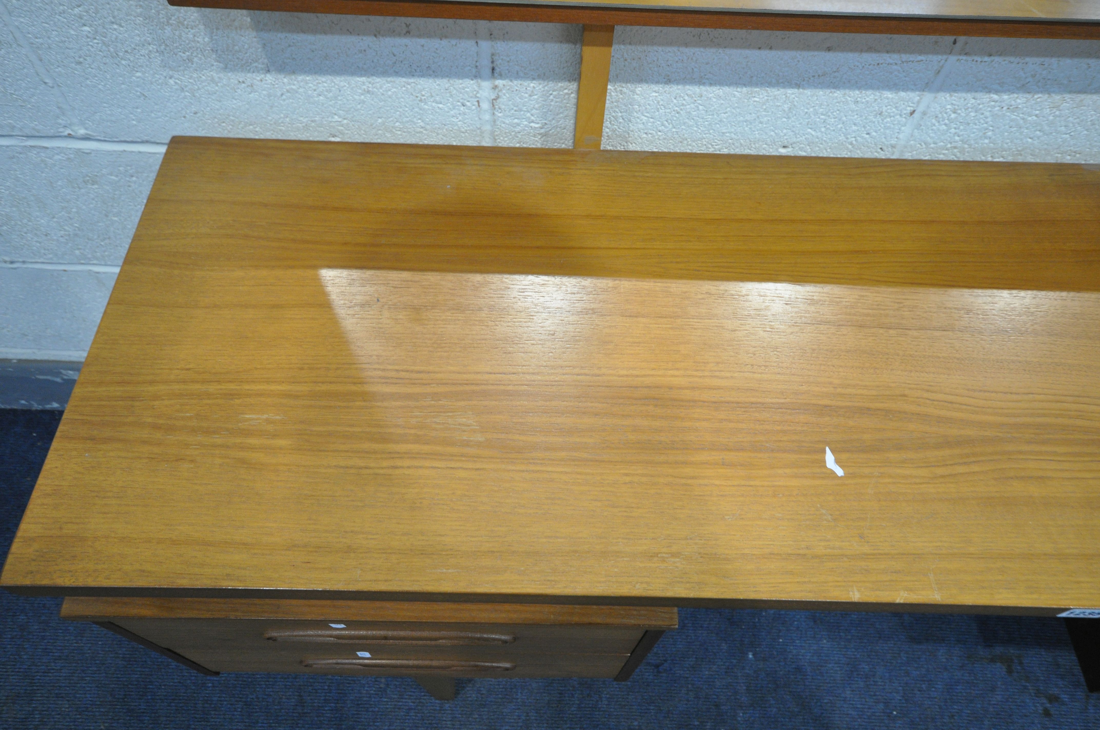A MID CENTURY TEAK DRESSING TABLE, with a single rectangular mirror, four drawers on square tapering - Image 2 of 3