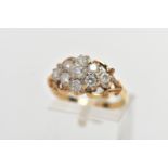 A 9CT YELLOW GOLD DIAMOND CLUSTER RING, of a lozenge shape, set with nine claw set round brilliant