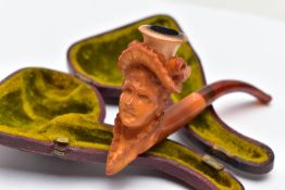 A MEERSCHAUM PIPE, a carved pipe depicting a late 19th century lady in a hat with flowers,