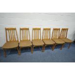 A SET OF SIX MID CENTURY TEAK DINING CHAIRS
