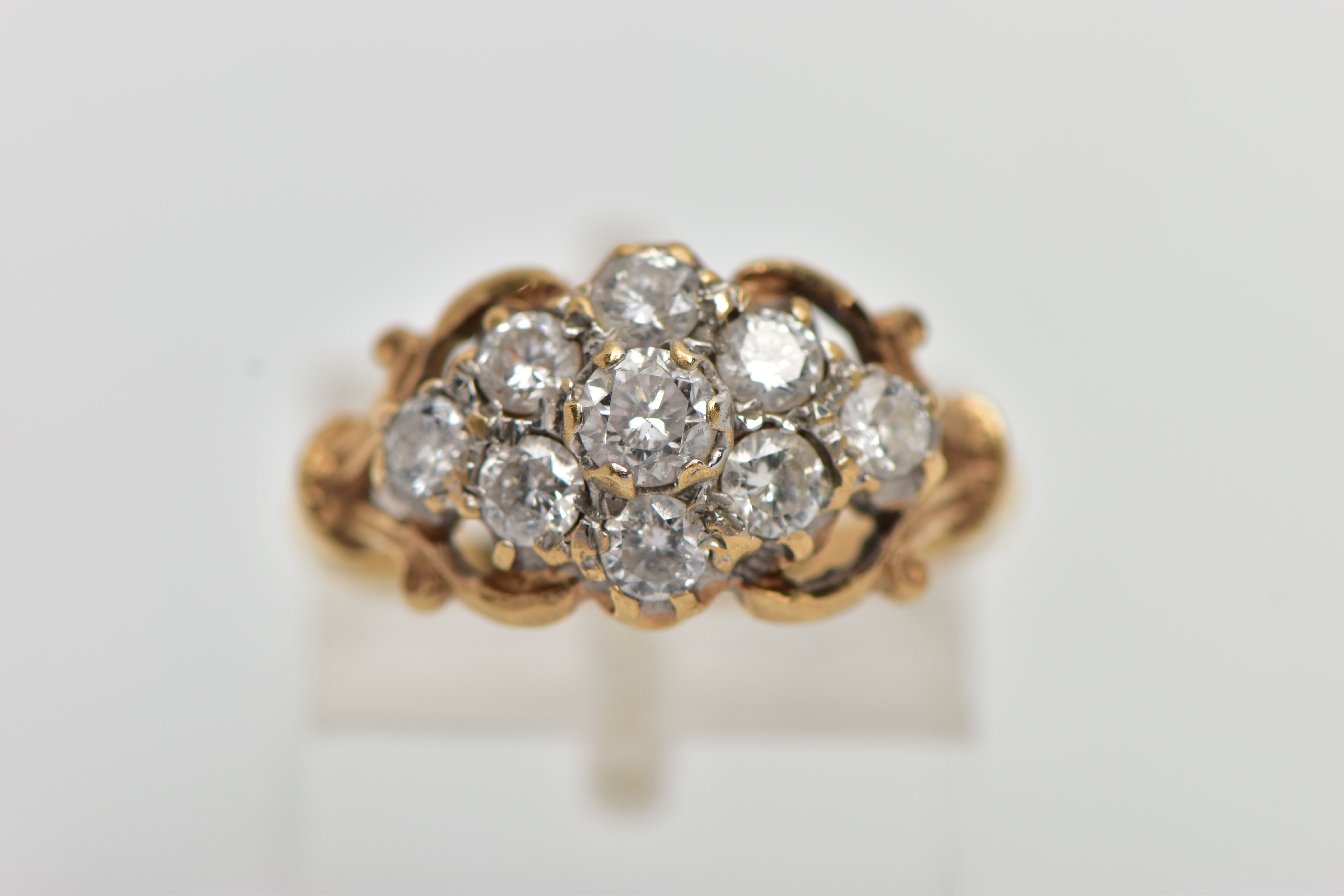 A 9CT YELLOW GOLD DIAMOND CLUSTER RING, of a lozenge shape, set with nine claw set round brilliant - Image 5 of 5