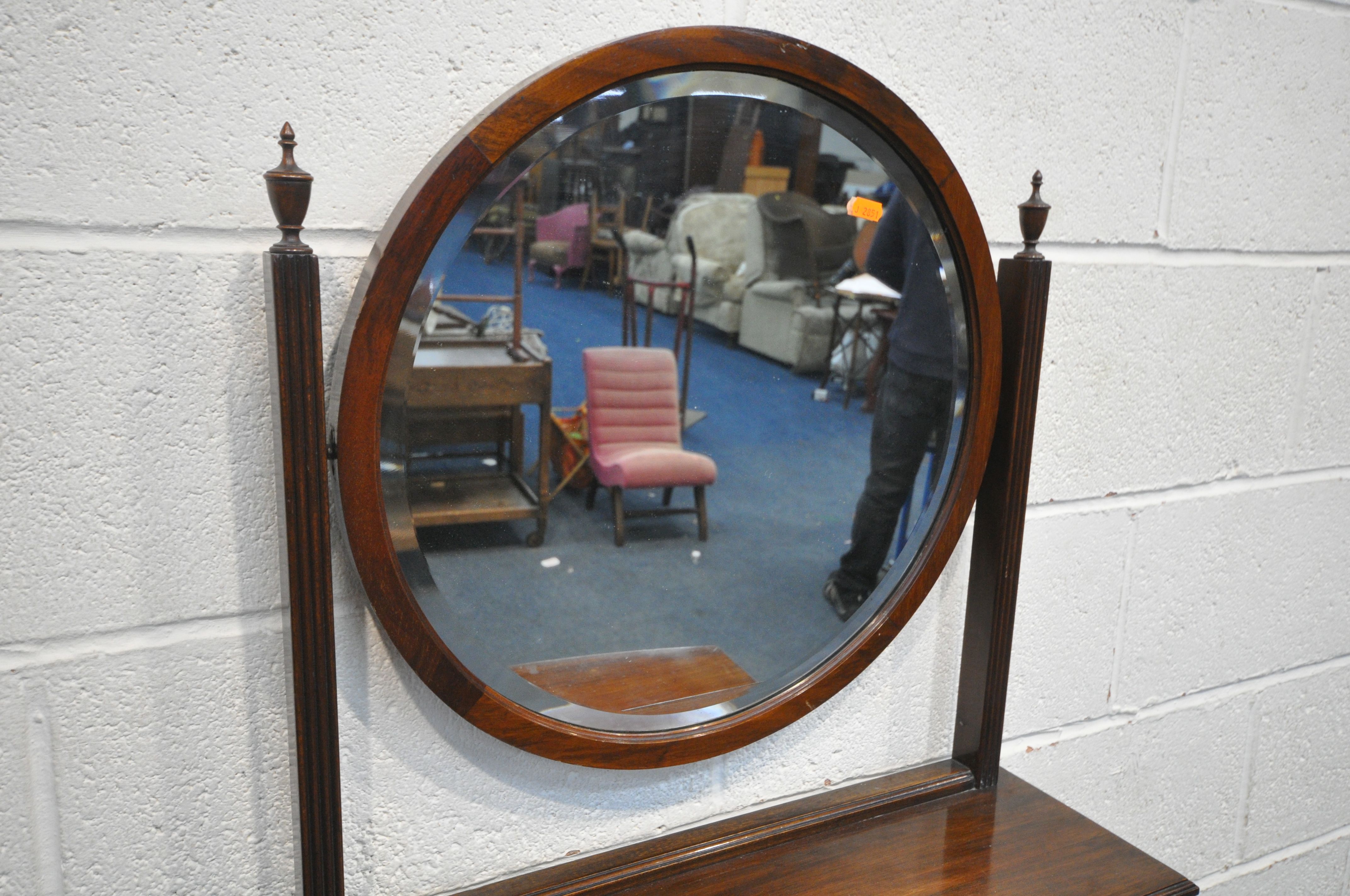 AN EDWARDIAN MAHOGANY BOW FRONT DRESSING CABINET, with a single circular bevelled mirror, two - Image 2 of 6