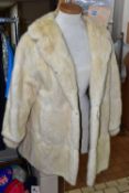 A CREAM FUR COAT, length 80cm, approximate size 14 (1) (Condition report: generally good, small