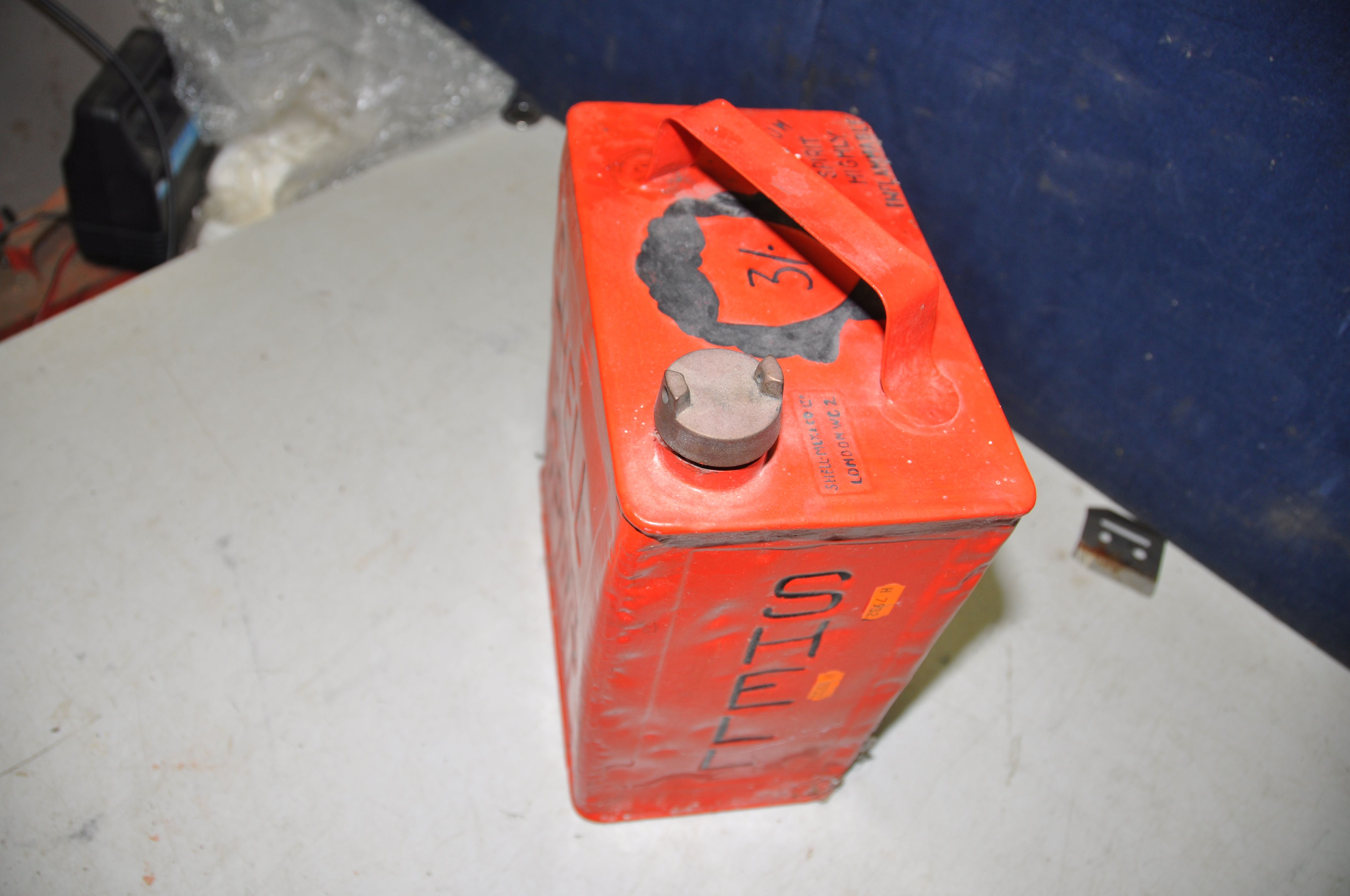 A VINTAGE SHELL OIL PETROL CAN with brass knob, overpainted in red - Image 2 of 2