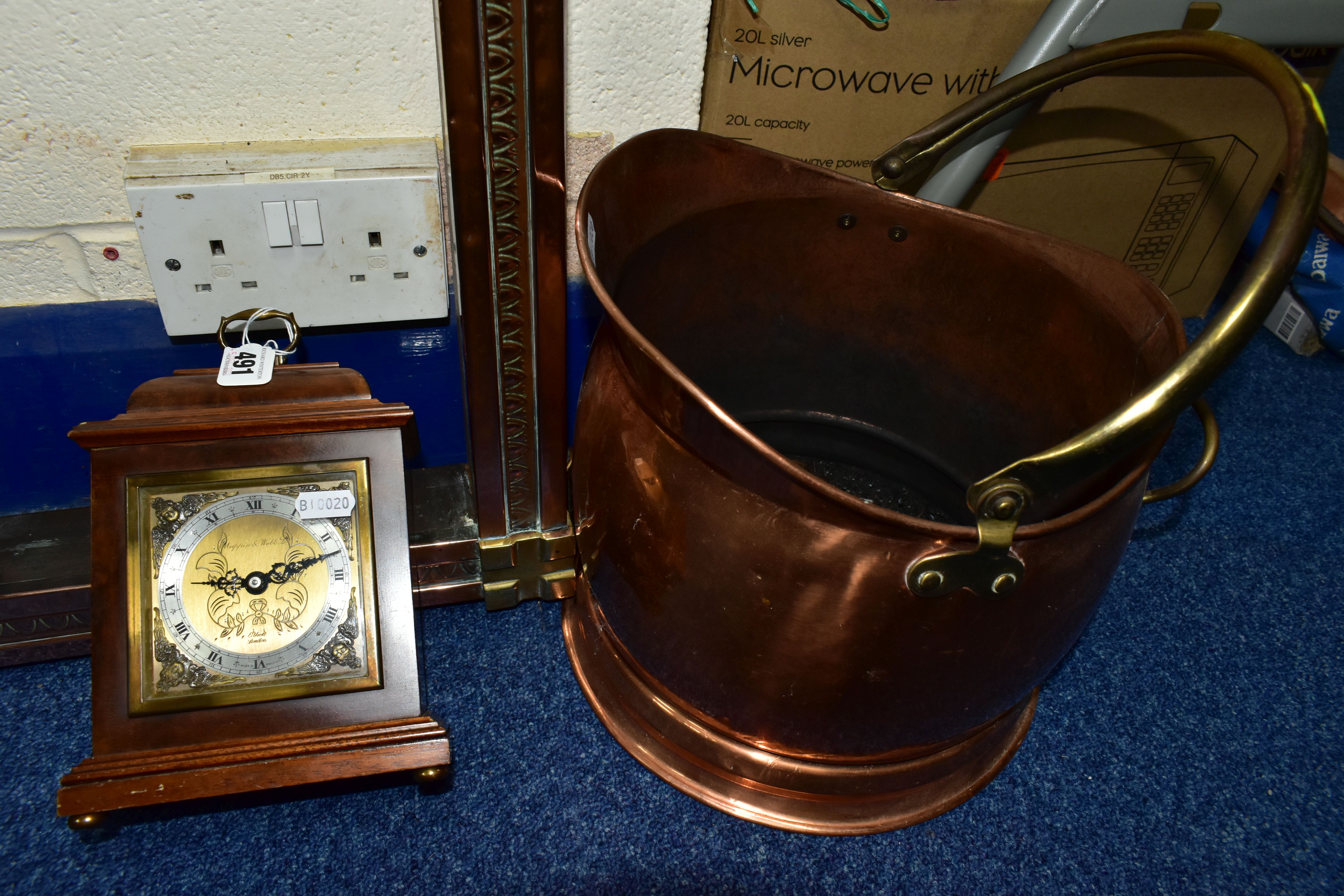 A MAPPIN & WEBB MANTEL CLOCK TOGETHER WITH A 20TH CENTURY COPPER FENDER, and a copper and brass coal