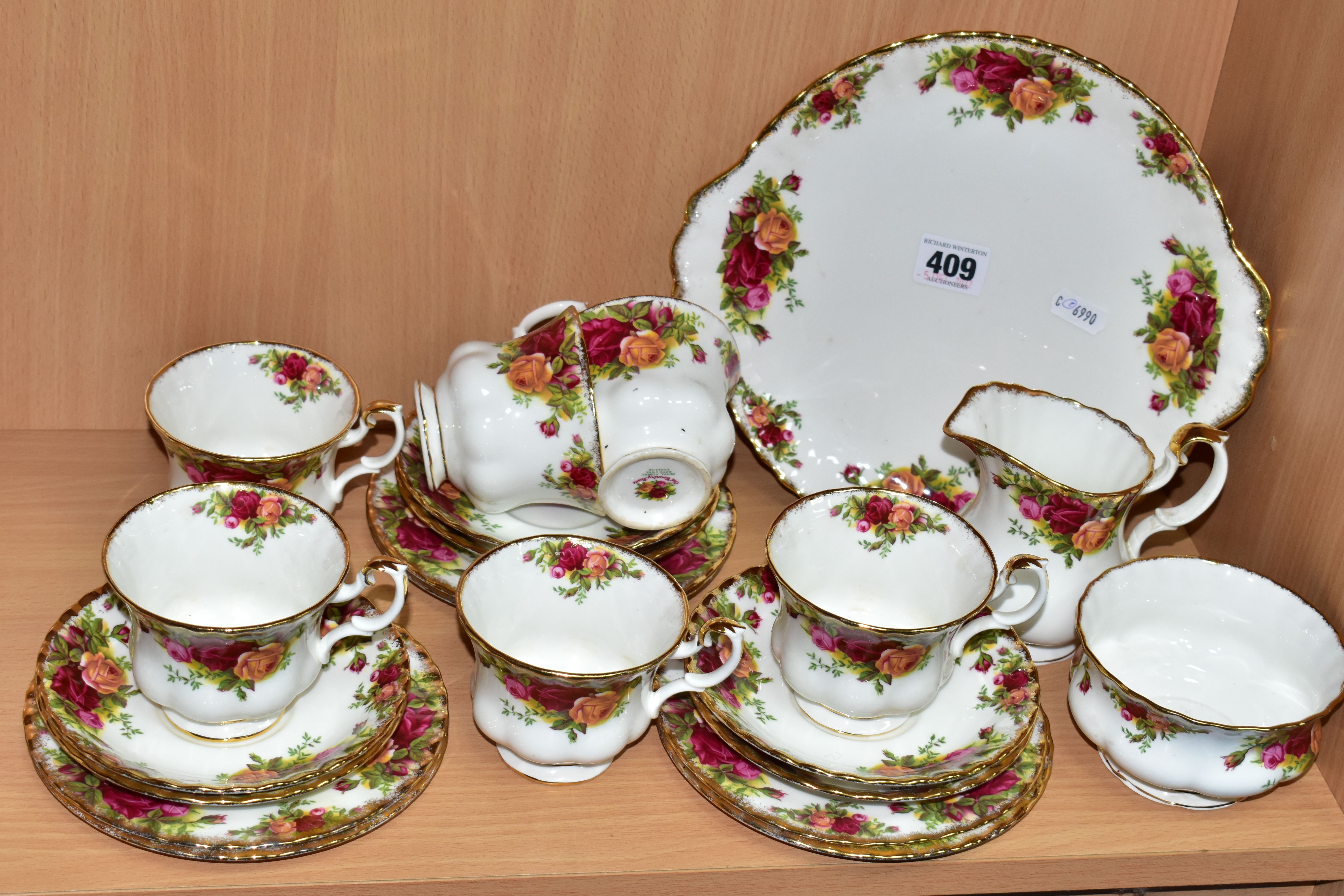 A TWENTY ONE PIECE ROYAL ALBERT OLD COUNTRY ROSES PART TEA SET, comprising a cream jug, a sugar