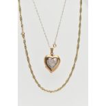 A 9CT GOLD DIAMOND SET LOCKET AND TWO CHAINS, the hinged locket of a heart form, set to the front