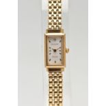 A 9CT GOLD 'ACCURIST' WRISTWATCH, quartz movement, rectangular mother of pearl dial, signed '