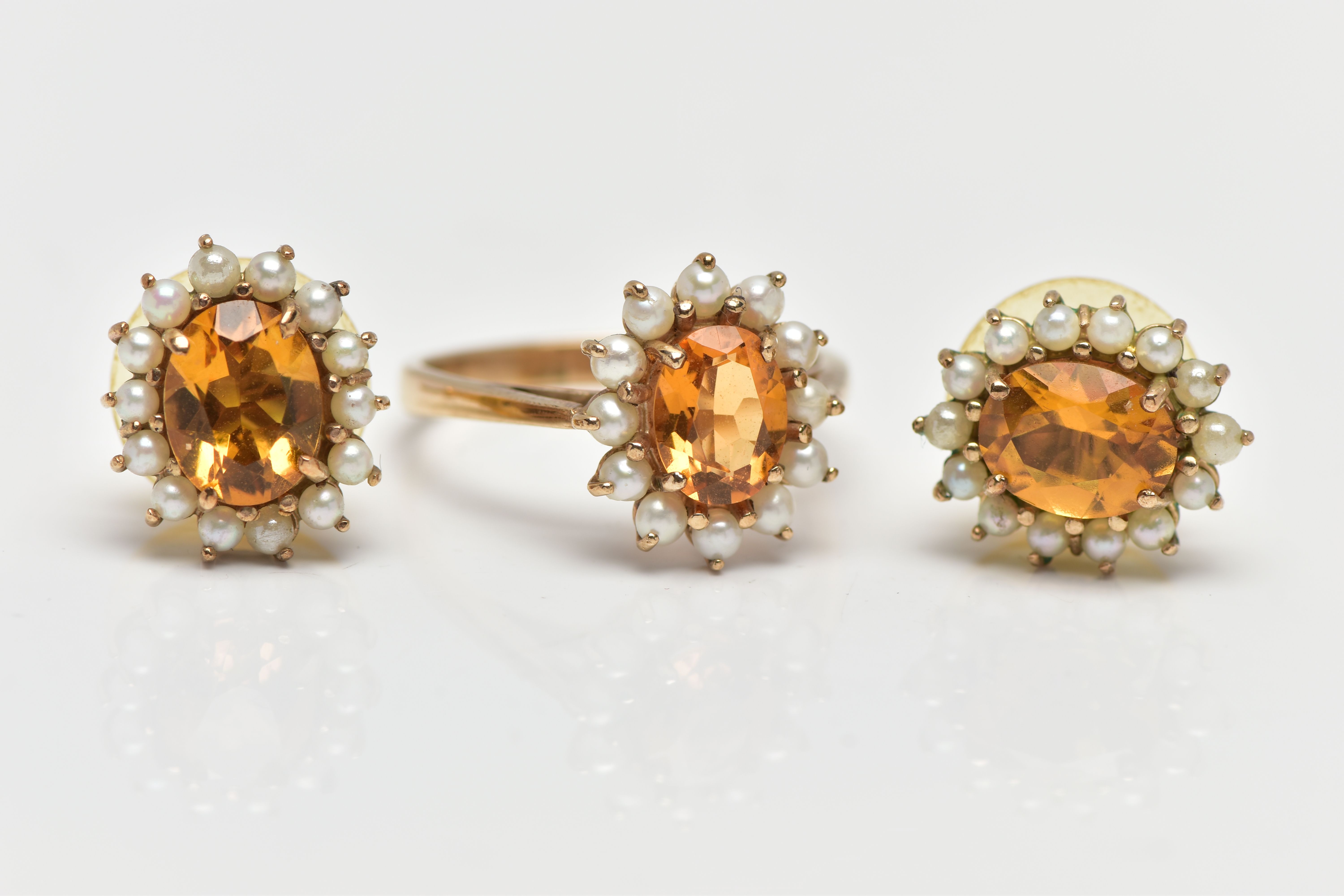 A 9CT YELLOW GOLD CITRINE AND PEARL CLUSTER RING AND A PAIR OF MATCHING YELLOW METAL EARRINGS, the