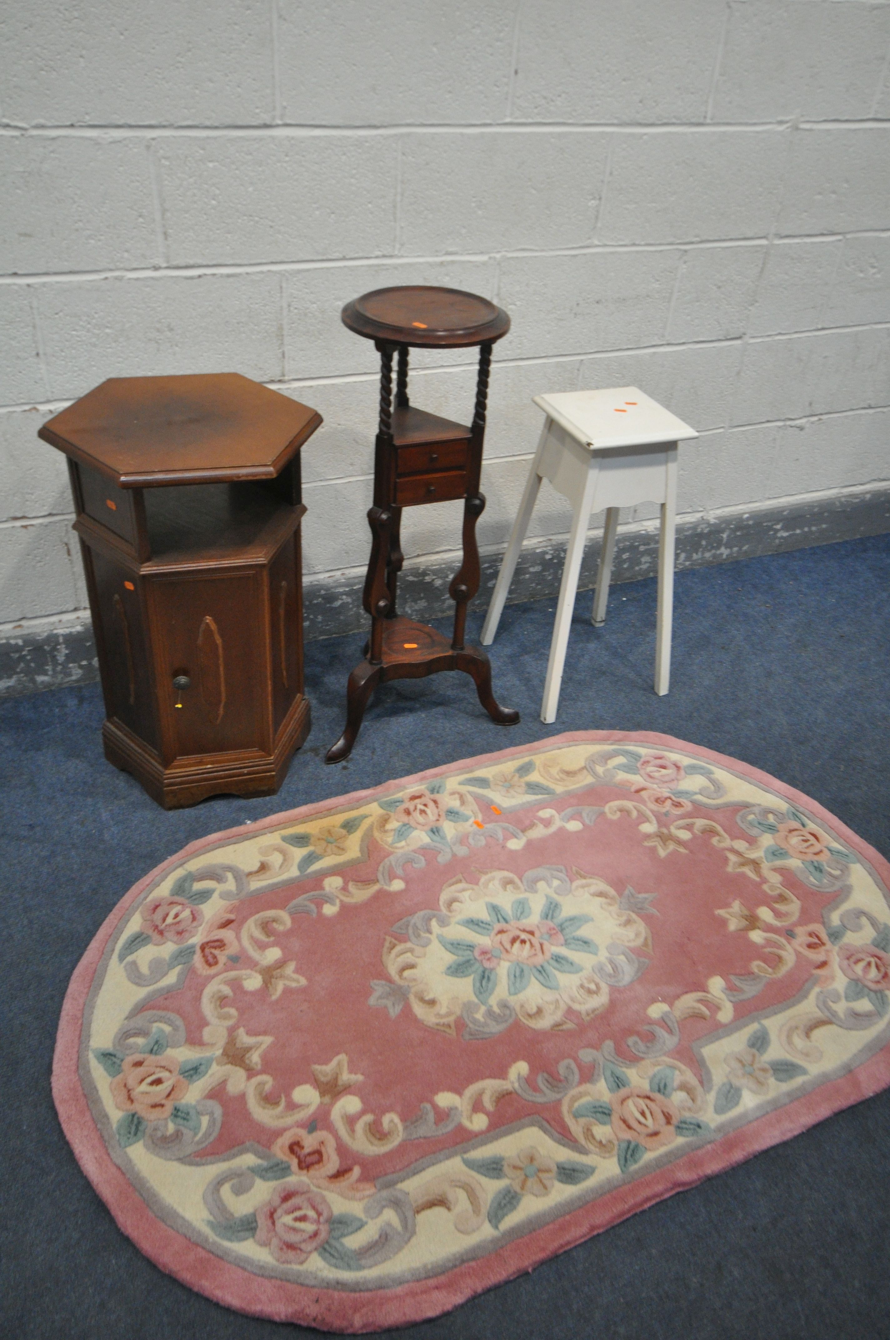 A MAHOGANY WIG STAND, with two drawers, height 86cm, a hexagonal side cabinet, a painted torcher,