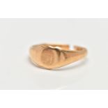 AN EARLY 20TH CENTURY 18CT YELLOW GOLD SIGNET RING, of shield shape outline with initial monogram,