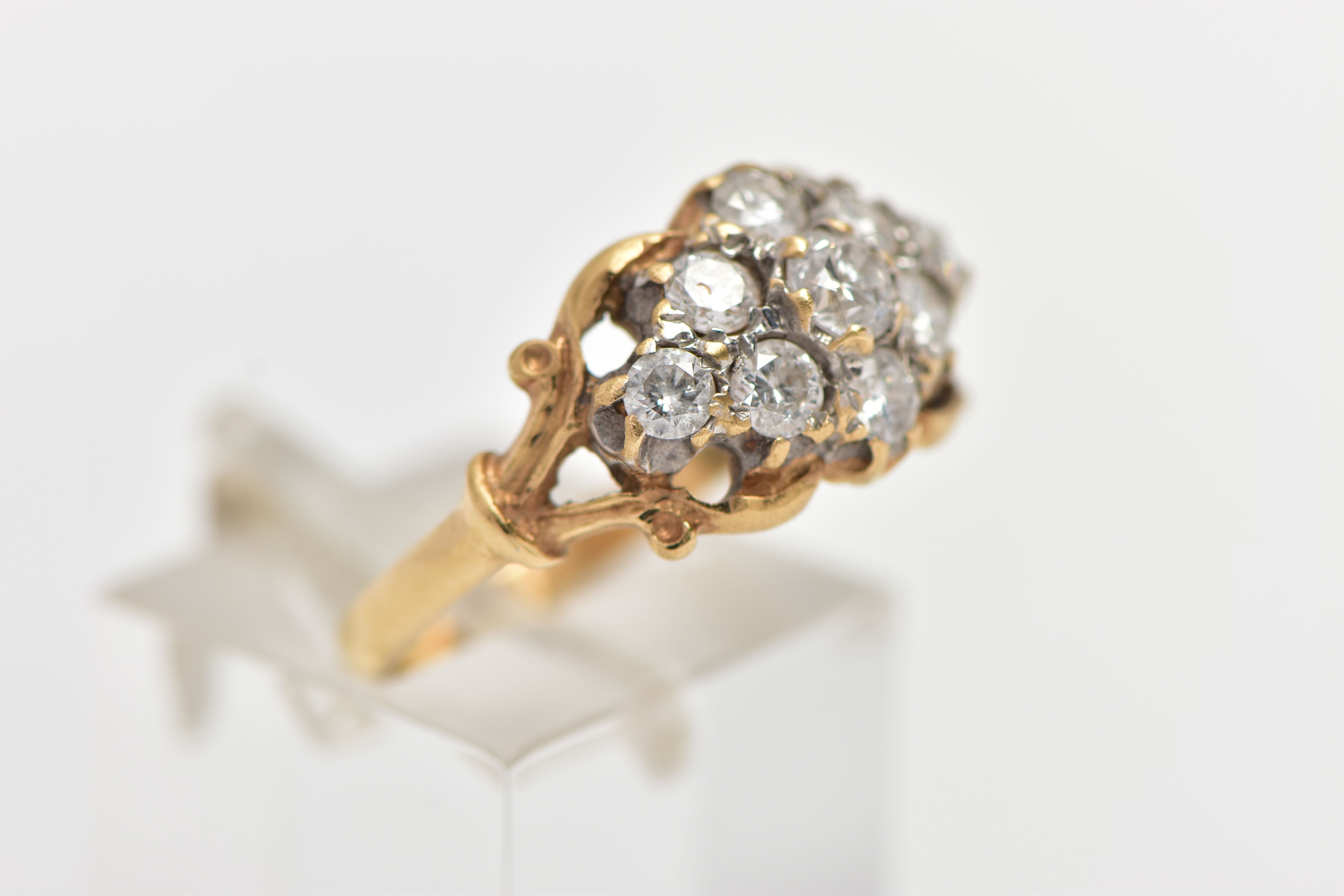 A 9CT YELLOW GOLD DIAMOND CLUSTER RING, of a lozenge shape, set with nine claw set round brilliant - Image 4 of 5