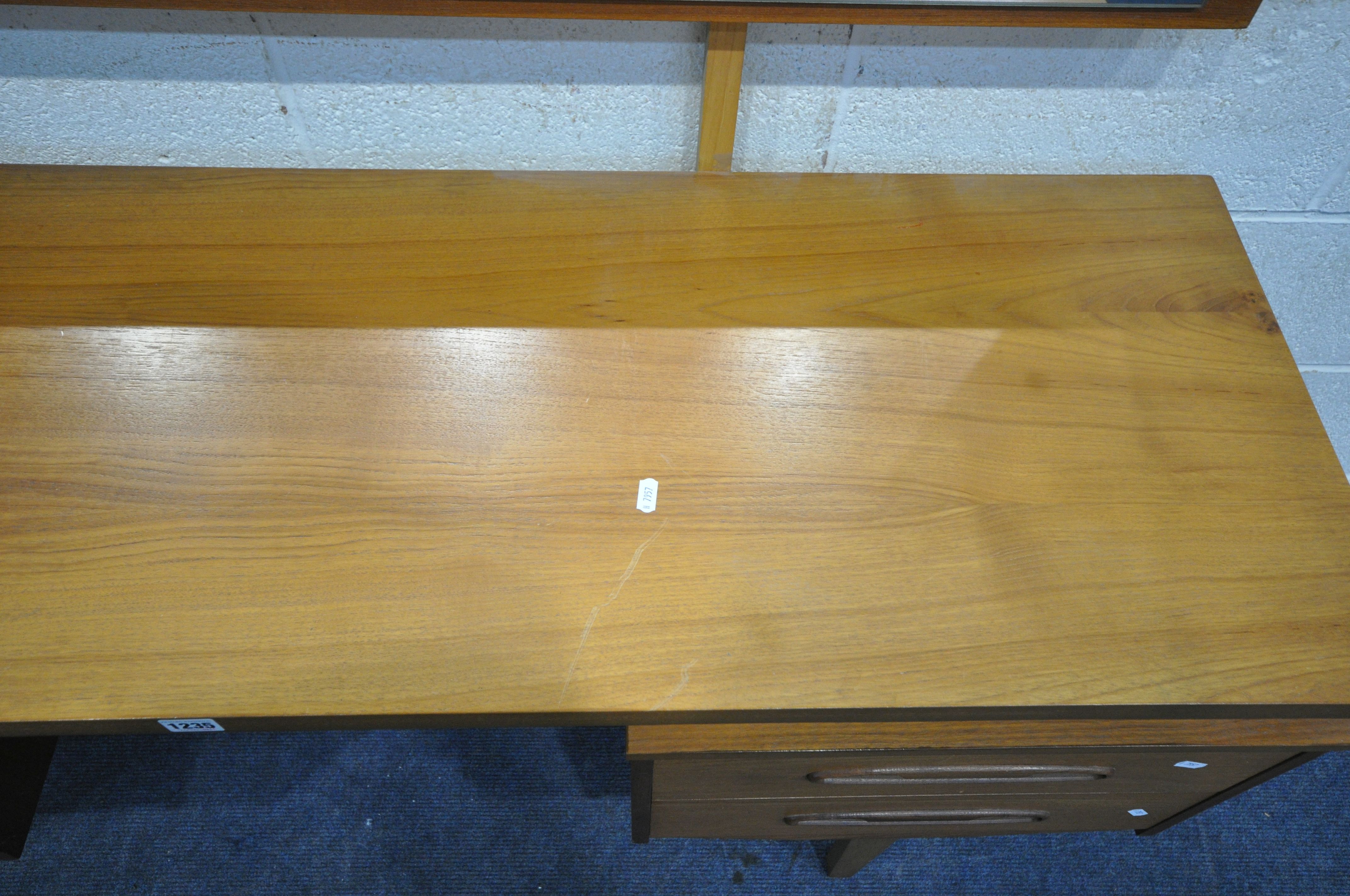 A MID CENTURY TEAK DRESSING TABLE, with a single rectangular mirror, four drawers on square tapering - Image 3 of 3