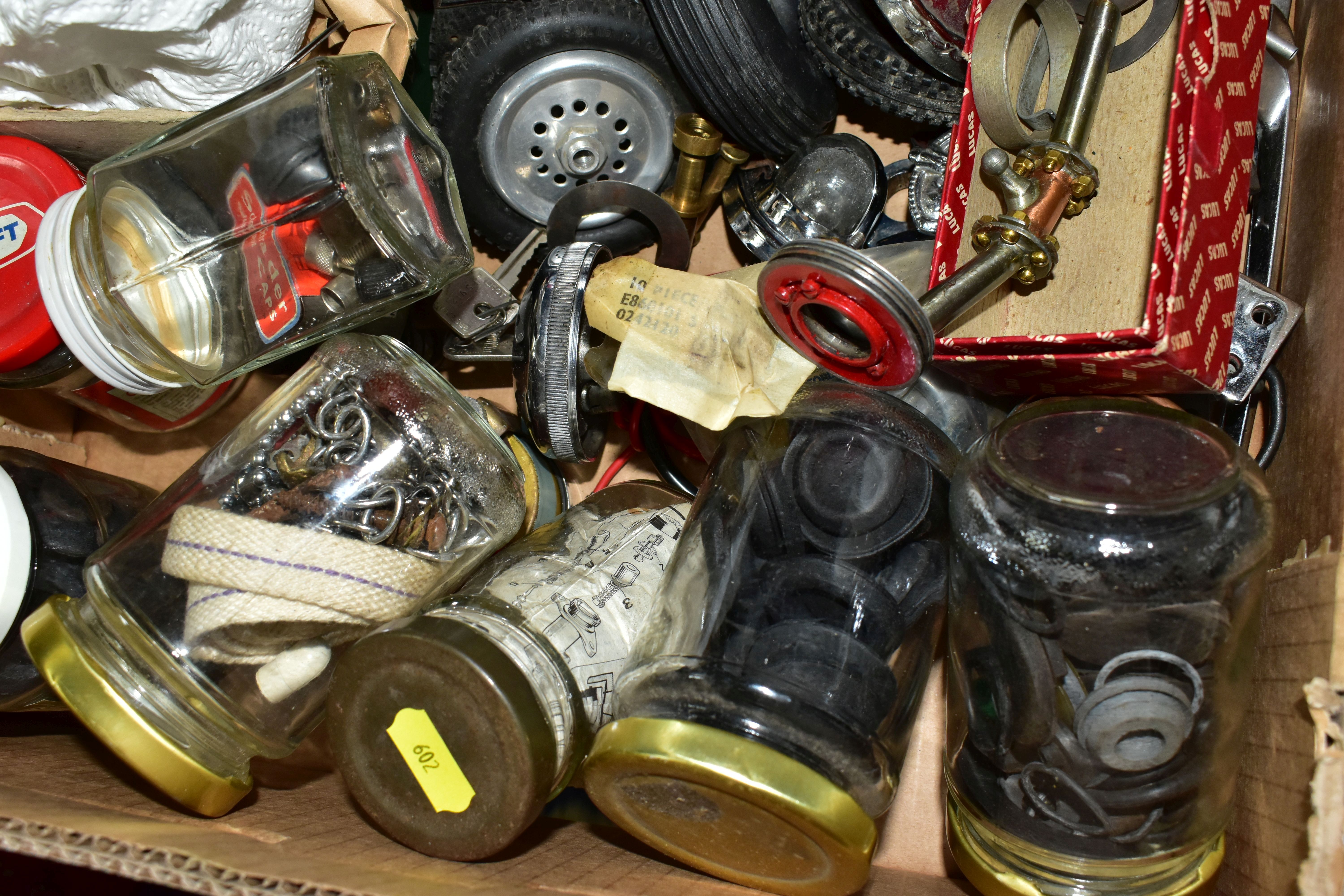 A BOX OF ASSORTED SPARE CAR RELATED AND MODEL CAR SPARE PARTS ETC, to include an unused Peco exhaust - Image 4 of 4