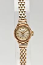 A LADIES 9CT GOLD 'ACCURIST' WRISTWATCH, manual wind, round silver dial signed 'Accurist, 21 jewels,