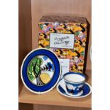 A BOXED WEDGWOOD CLARICE CLIFF LIMITED EDITION 'MAY AVENUE' CONICAL TEACUP, SAUCER AND SIDE PLATE,