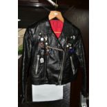 A BLACK LEATHER PIN BADGE BIKER'S JACKET, size small, Frank N Furter style, with sixteen metal pin