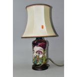A MOORCROFT POTTERY 'GYPSY' PATTERN TABLE LAMP, of waisted cylindrical form, tube lined with
