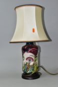 A MOORCROFT POTTERY 'GYPSY' PATTERN TABLE LAMP, of waisted cylindrical form, tube lined with
