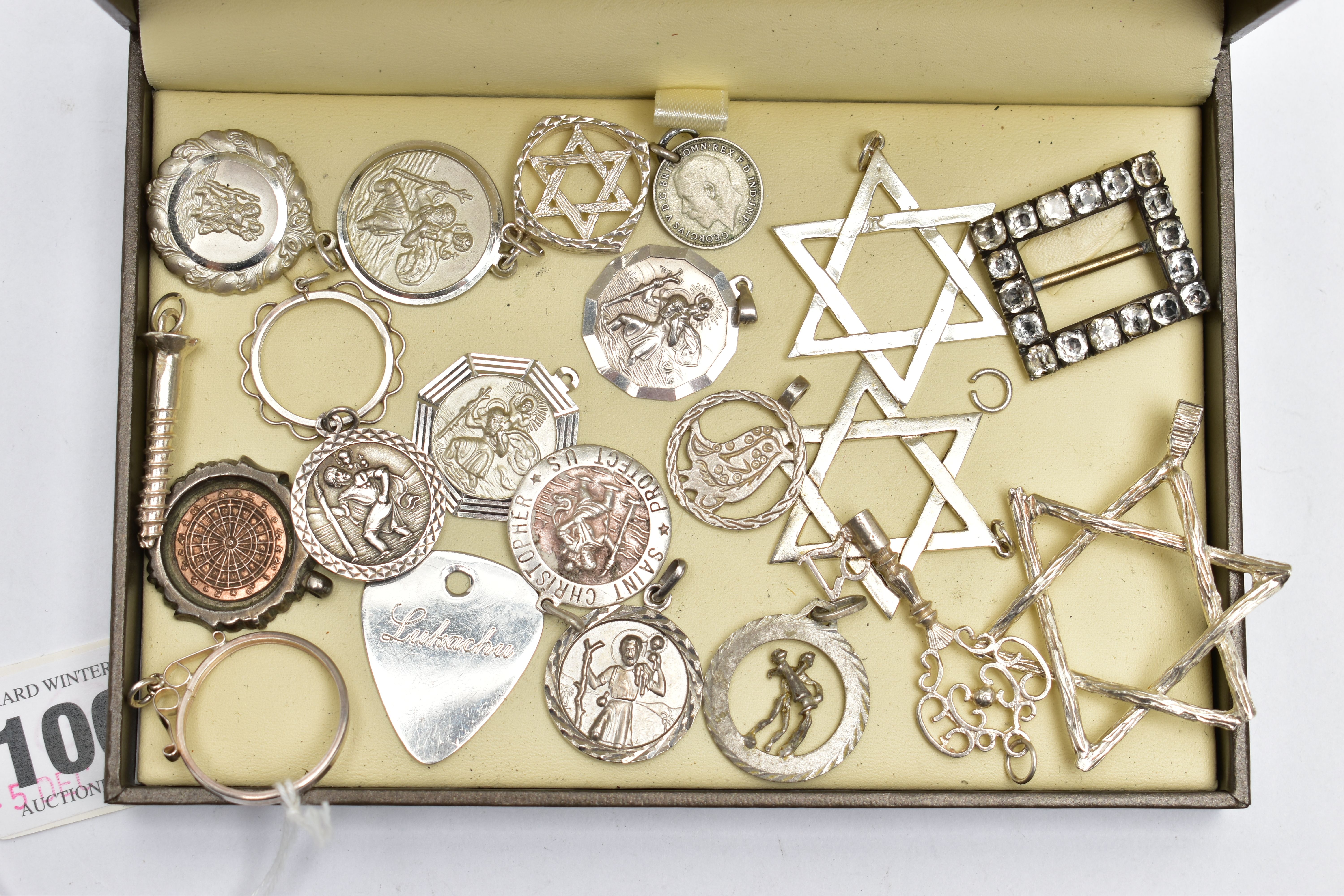 ASSORTED SILVER AND WHITE METAL PENDANTS, the first a silver darts medal, hallmarked Chester 1939,